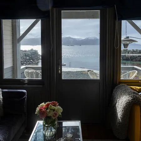 Seahouse With Shoreline In Kalvag